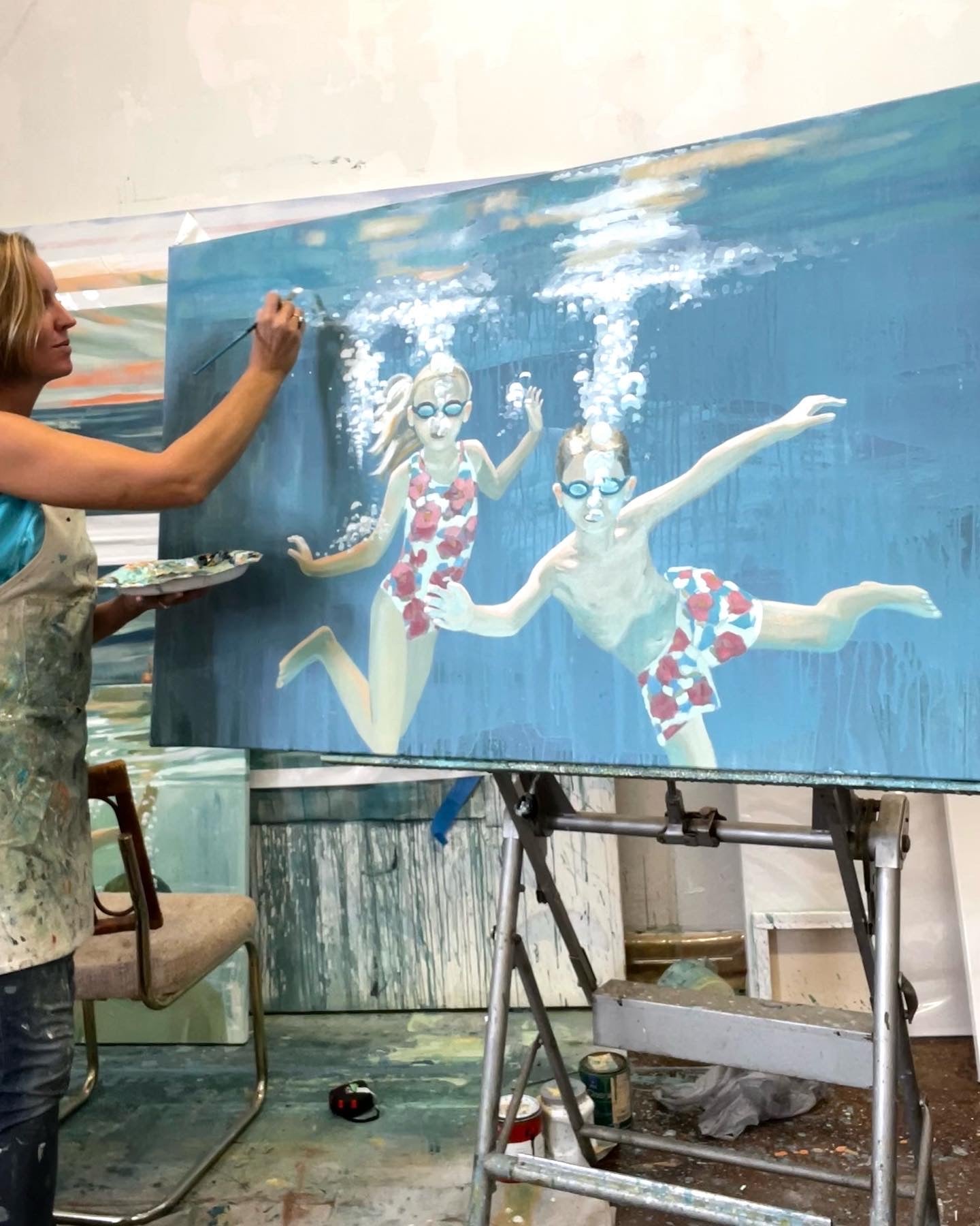 Portrait artist 2 kids underwater