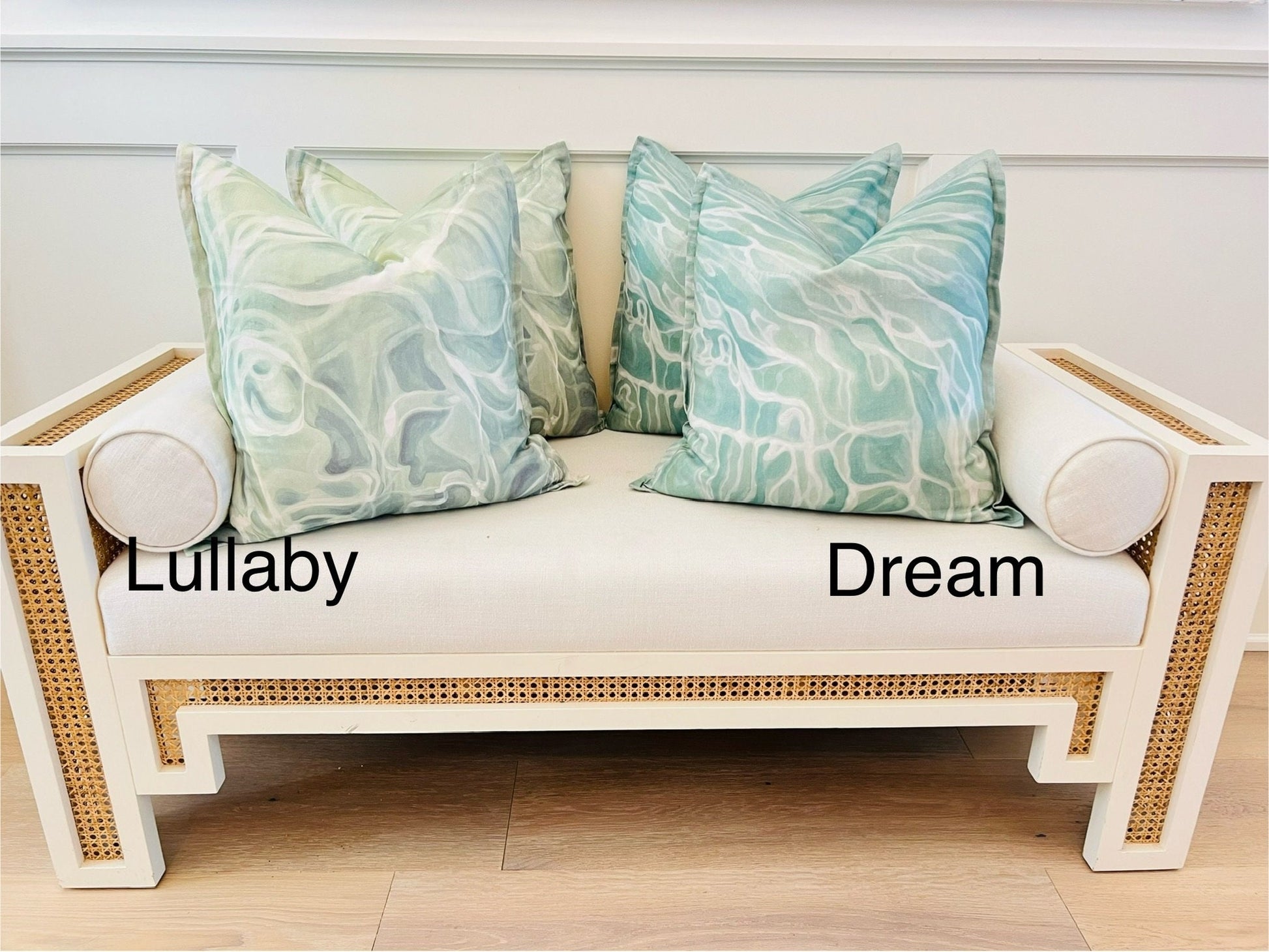lullaby dream pillows on couch labeled
